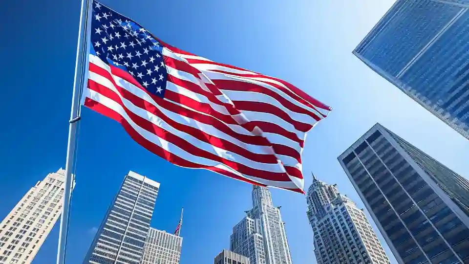 US flag and USCIS building representing visa bulletin update